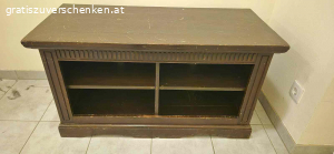 Fernsehbank zu verschenken. Schöne dunkelbraune Fernsehbank zu verschenken. Leichte Gebrauchspuren. Mit Fächern. Habe leider keinen Platz mehr dafür in der neuen Wohnung.